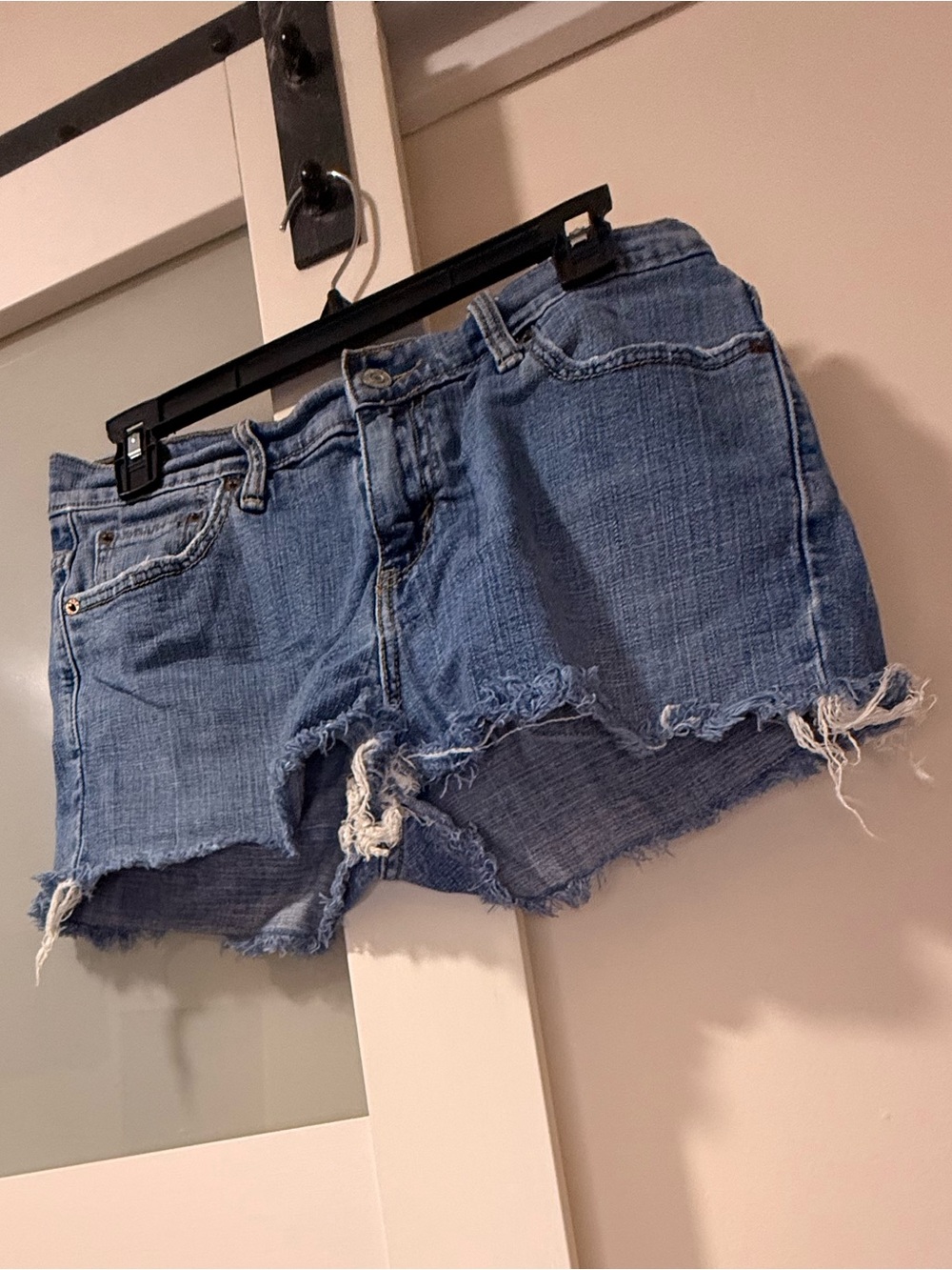 Levi's Distressed Mid-Blue Denim Cutoff Shorts